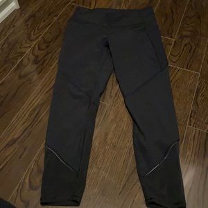 Black lululemon leggings. Mesh bottoms. Size 8.